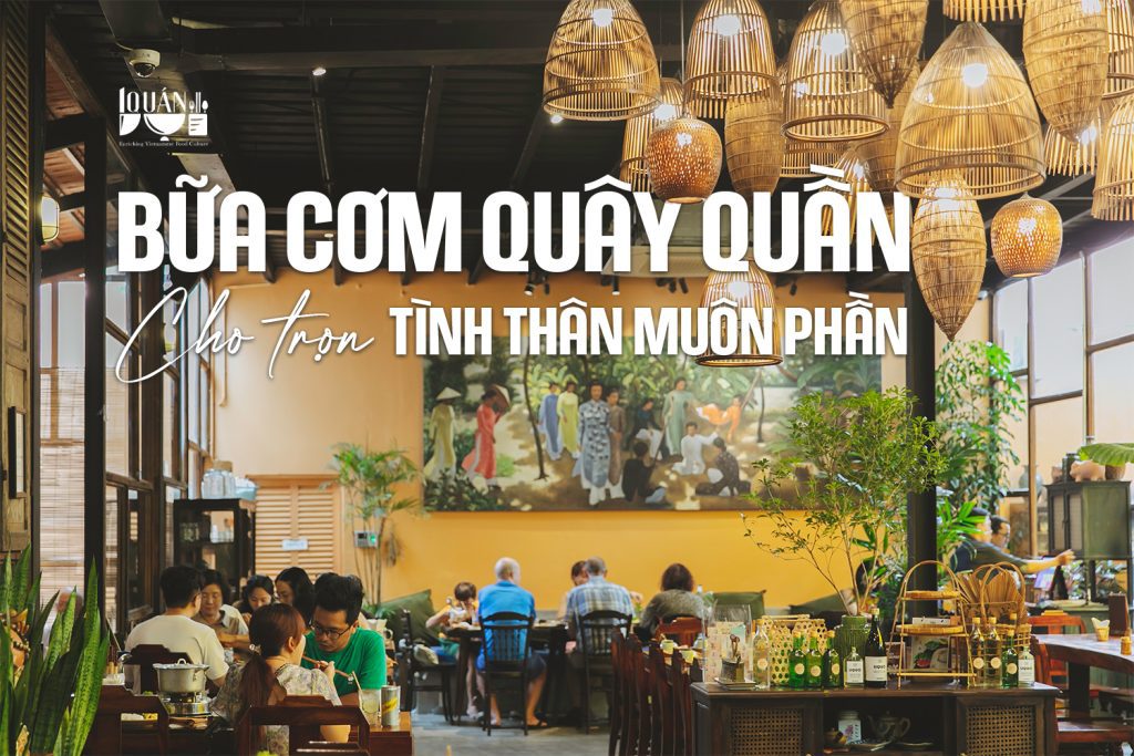 Không gian ấm cúng của Quán Bụi tại TP.HCM với phong cách mộc mạc, treo nhiều đèn tre trang trí, bức tranh tường gợi nhớ làng quê Việt Nam, khách thưởng thức bữa cơm gia đình đậm chất Bắc Bộ.